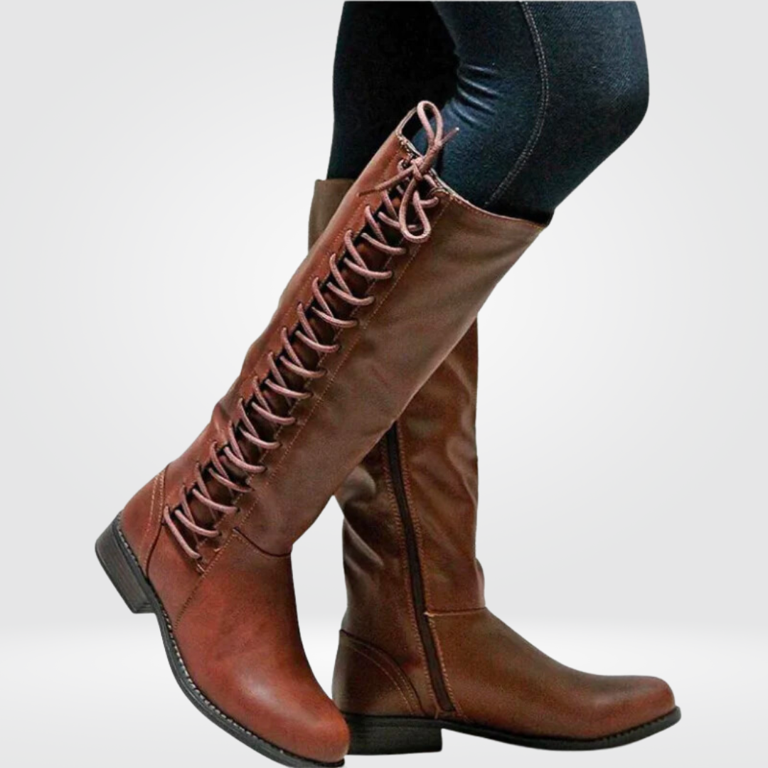 Women's black knee high boots with a block heel in faux leather