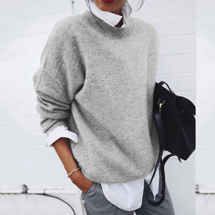 Grey cashmere crew neck jumper with a minimalist, breathable feel