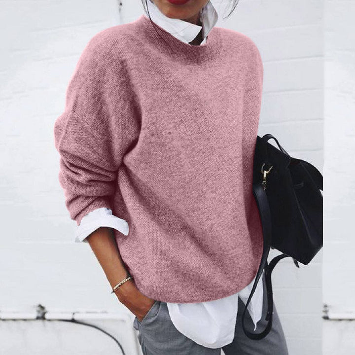 Grey cashmere crew neck jumper with a minimalist, breathable feel