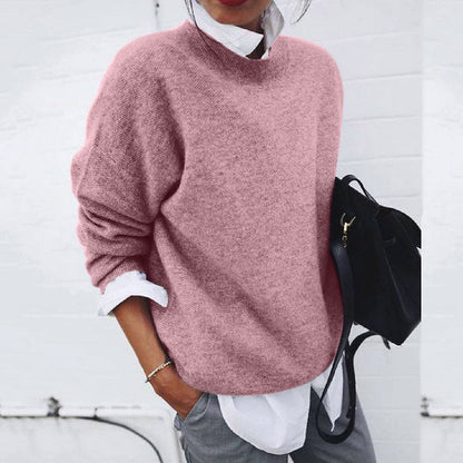 Grey cashmere crew neck jumper with a minimalist, breathable feel