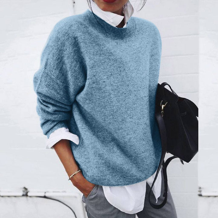 Grey cashmere crew neck jumper with a minimalist, breathable feel