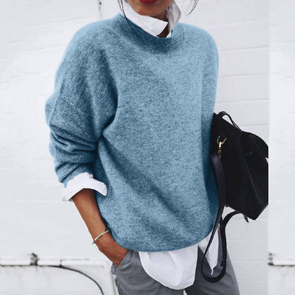 Grey cashmere crew neck jumper with a minimalist, breathable feel