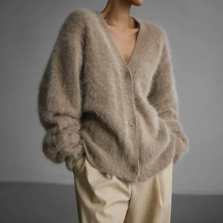 Beige cashmere cardigan with a relaxed, loose fit for layering