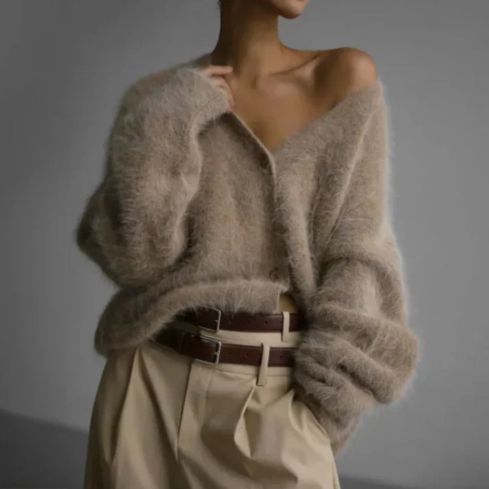 Beige cashmere cardigan with a relaxed, loose fit for layering