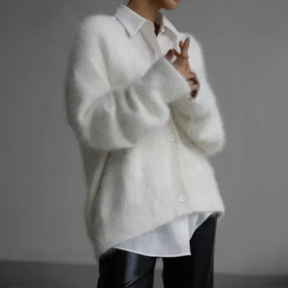 Beige cashmere cardigan with a relaxed, loose fit for layering