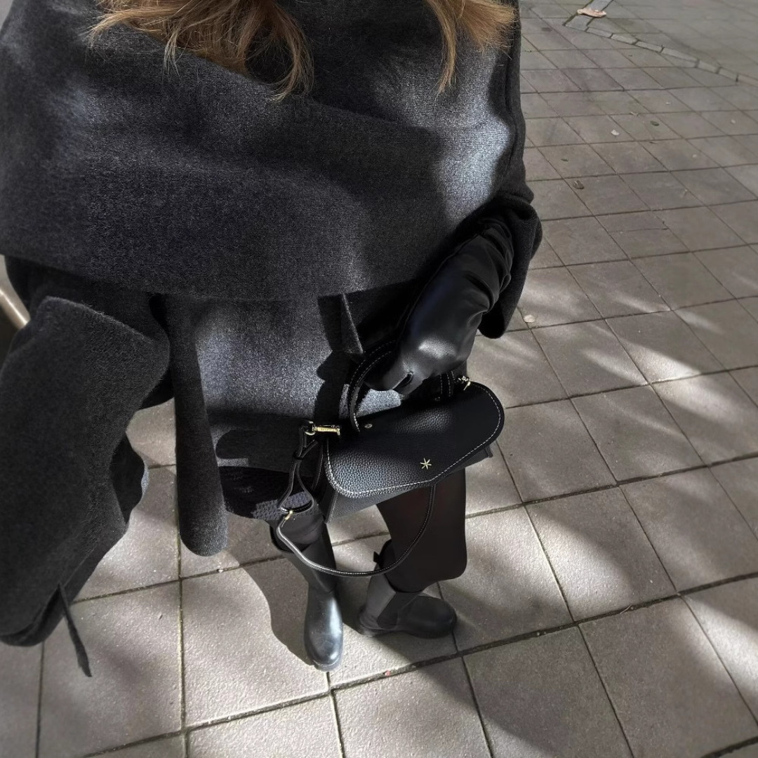Dark grey asymmetric wool blend poncho with a slip-on silhouette for autumn layering