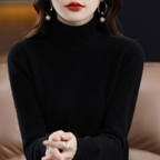Black cashmere roll neck jumper with a cosy, elegant finish for autumn layering