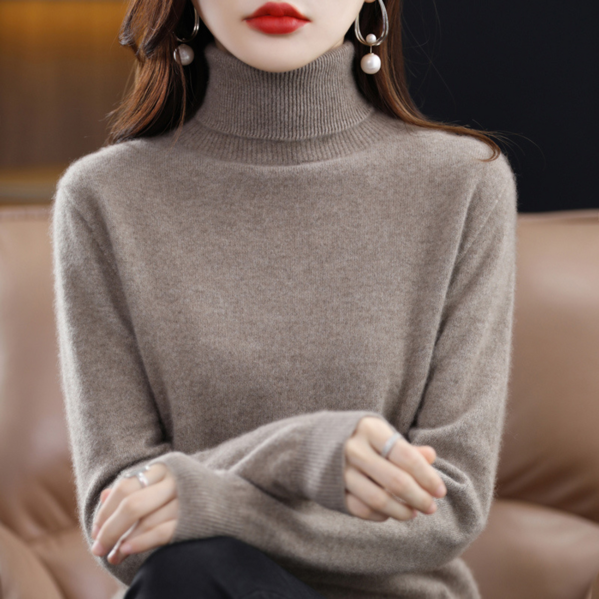 Light blue cashmere roll neck jumper with a cosy, elegant finish for autumn layering