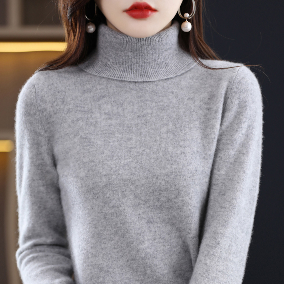 Light blue cashmere roll neck jumper with a cosy, elegant finish for autumn layering