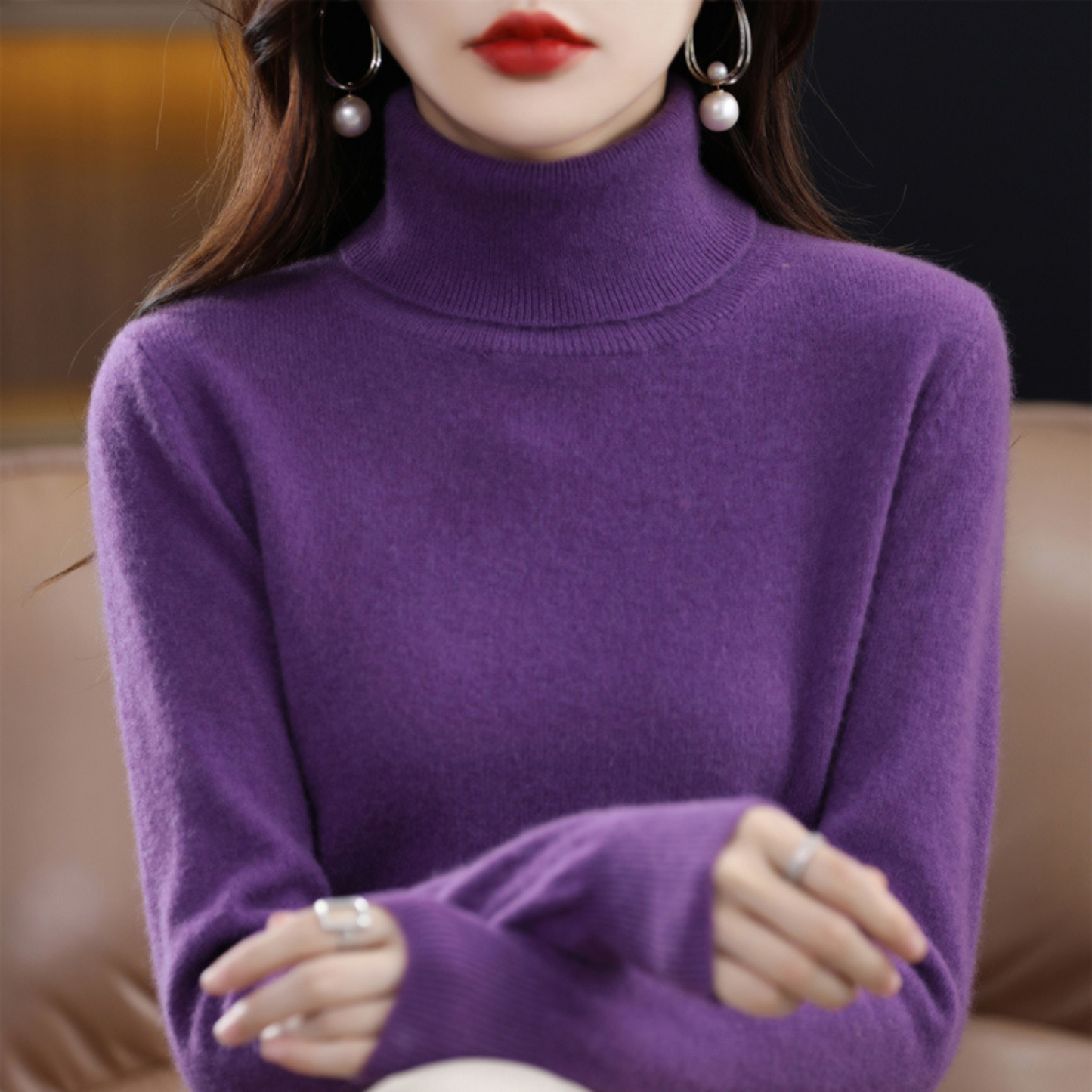 Black cashmere roll neck jumper with a cosy, elegant finish for autumn layering