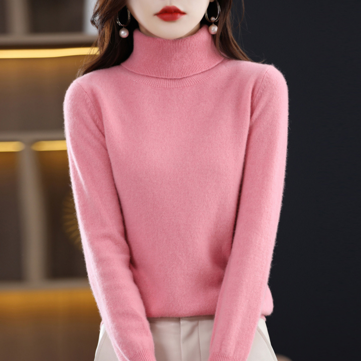 Black cashmere roll neck jumper with a cosy, elegant finish for autumn layering