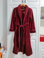 Women's purple fleece dressing gown with a soft shawl collar and tie belt