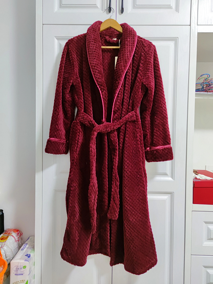 Women's purple fleece dressing gown with a soft shawl collar and tie belt