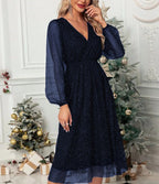 Women's navy festive sparkle midi dress with puff sleeves and a V neckline