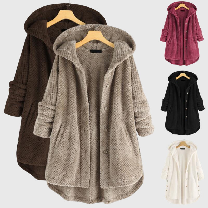 Women's white hooded fleece jacket with a plush zip-through front