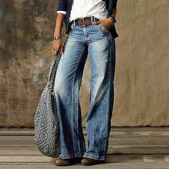 Women's light blue baggy wide leg jeans with a retro faded denim wash