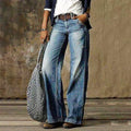 Women's light blue baggy wide leg jeans with a retro faded denim wash