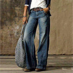 Women's blue baggy wide leg jeans with a retro faded denim wash