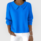 Green classic knit jumper with a soft, relaxed fit for transitional layering