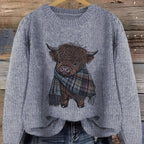 Highland cow print crewneck jumper, close-up detail