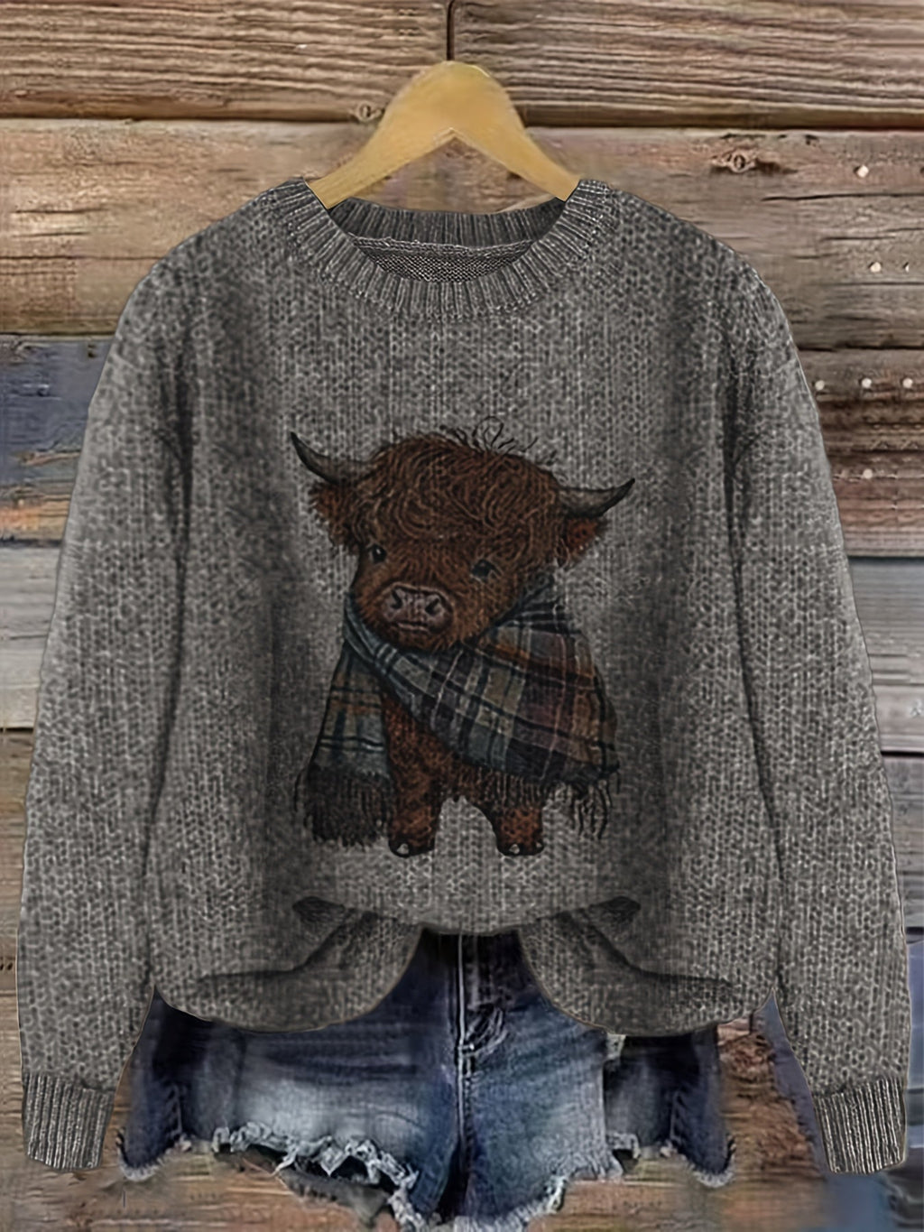 Highland cow print crewneck jumper, side view