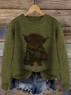 Highland cow print jumper laid flat