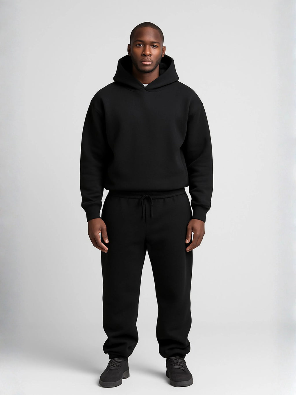 Men's black oversized hoodie and jogger tracksuit set