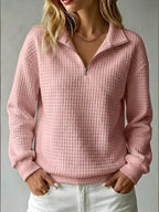 Women's pink half zip quilted sweatshirt with fold-over collar