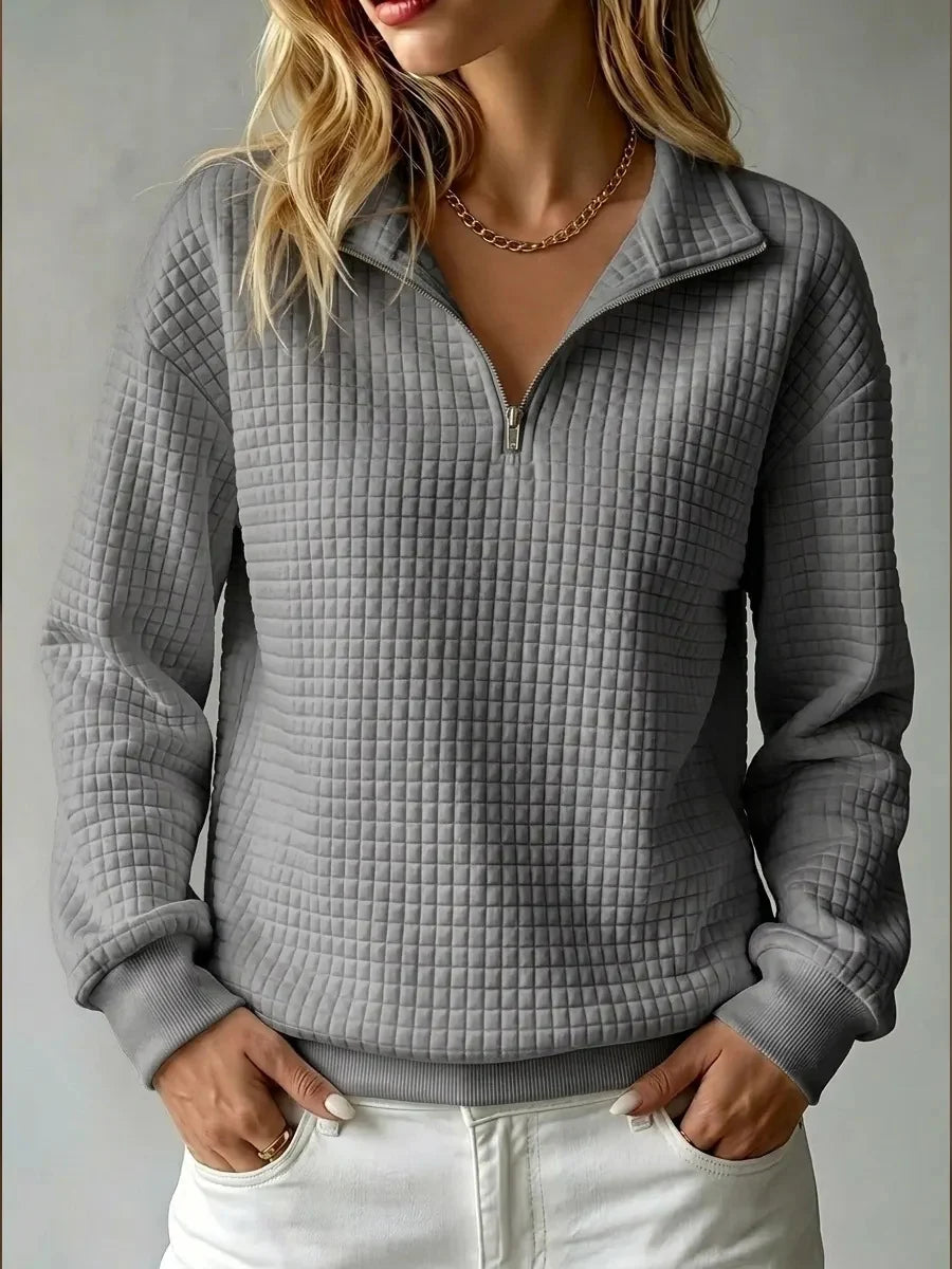 Women's grey half zip quilted sweatshirt with fold-over collar
