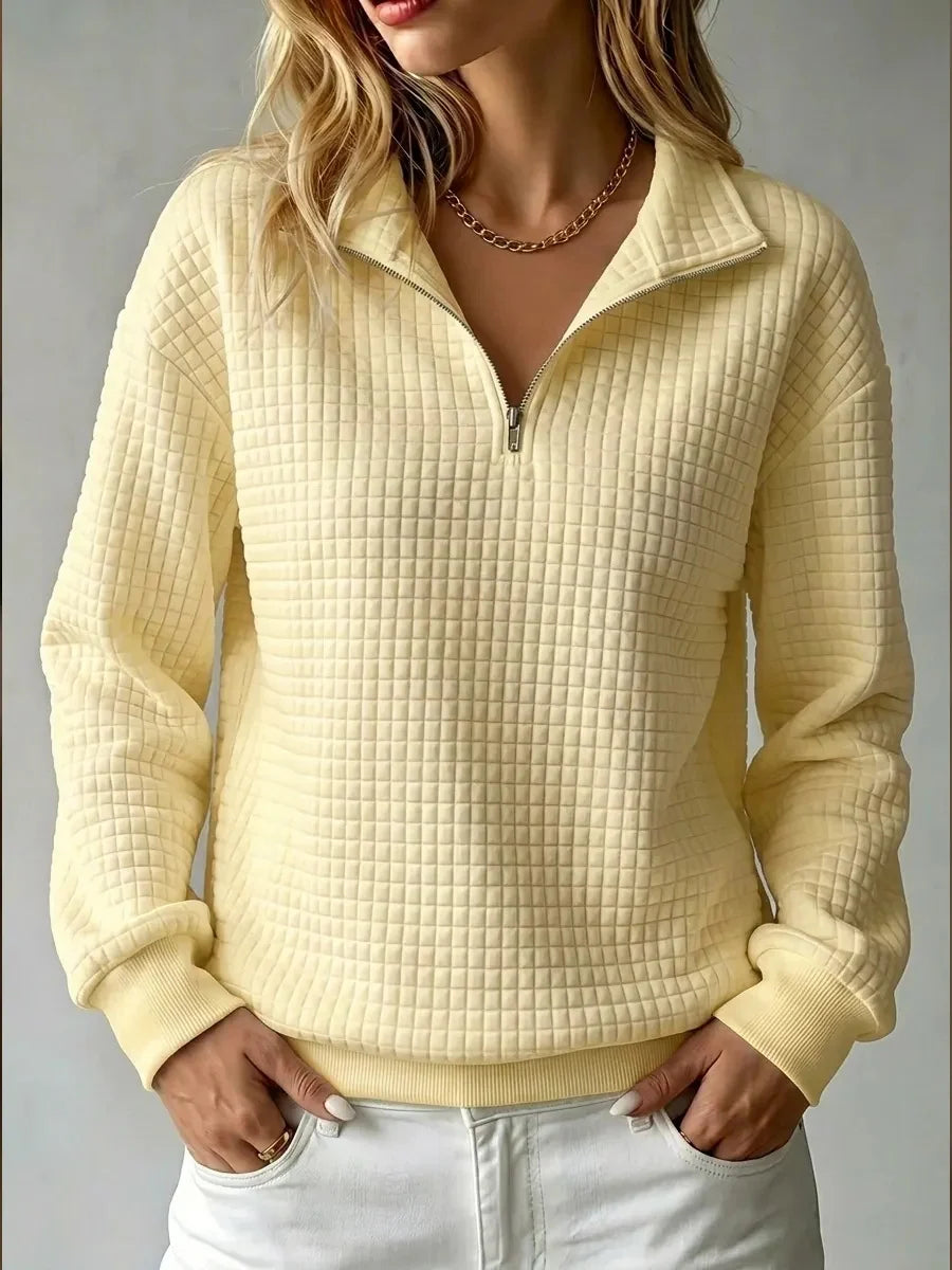 Women's yellow half zip quilted sweatshirt with fold-over collar
