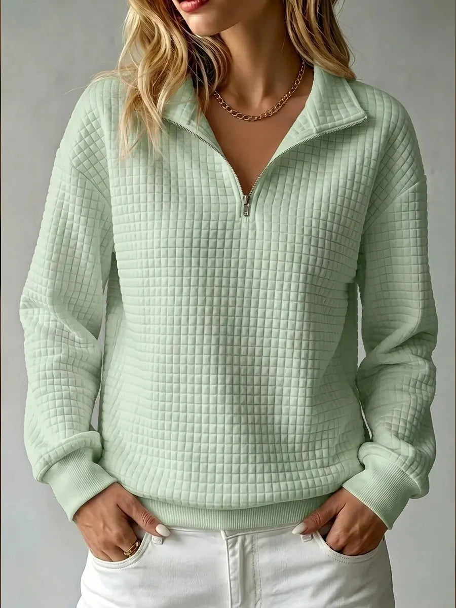 Women's green half zip quilted sweatshirt with fold-over collar