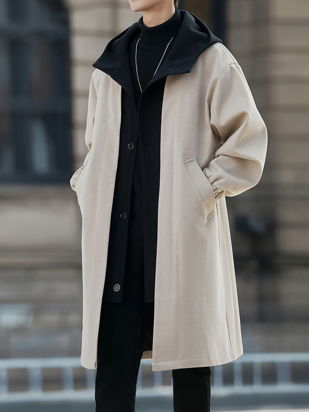 Oversized hooded longline coat, side view