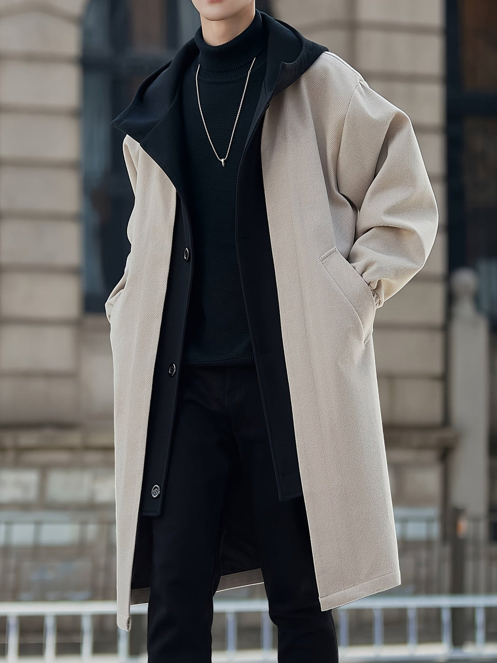 Close-up of pocket detail on oversized longline coat