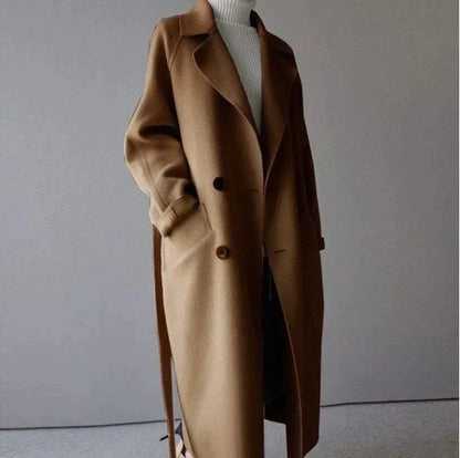 Women's beige longline wool blend coat with a tailored, elegant fit