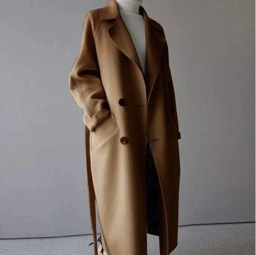 Women's beige longline wool blend coat with a tailored, elegant fit