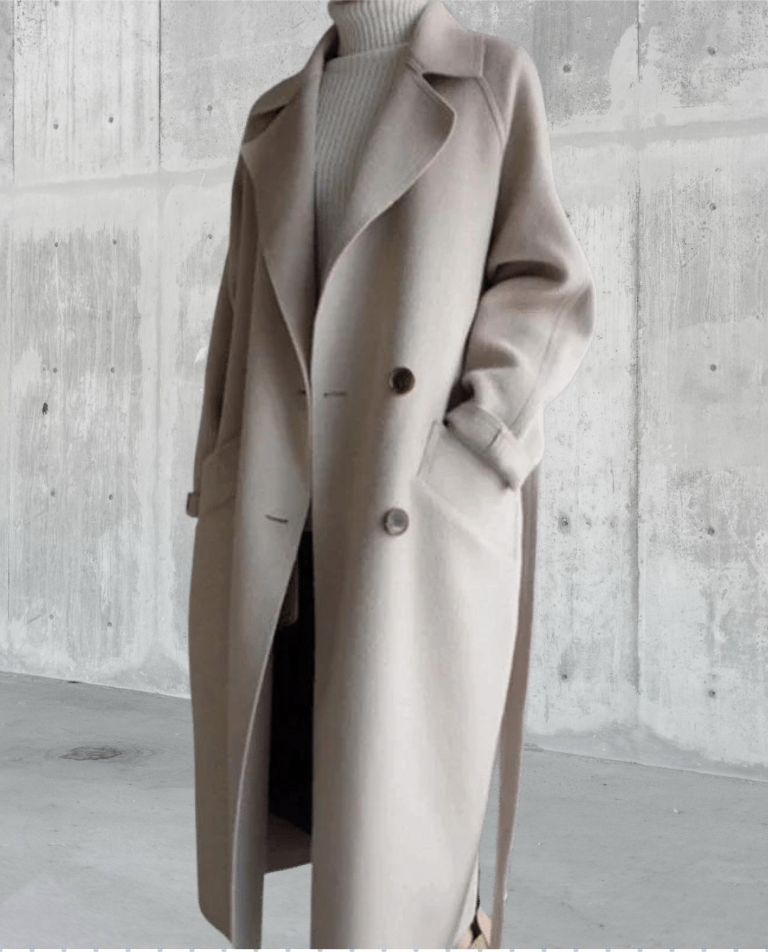 Women's beige longline wool blend coat with a tailored, elegant fit