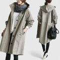 Women's light grey oversized parka with an adjustable hood