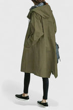 Women's light grey oversized parka with an adjustable hood