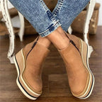 Waterproof wide fit boots with textured sole, product still life