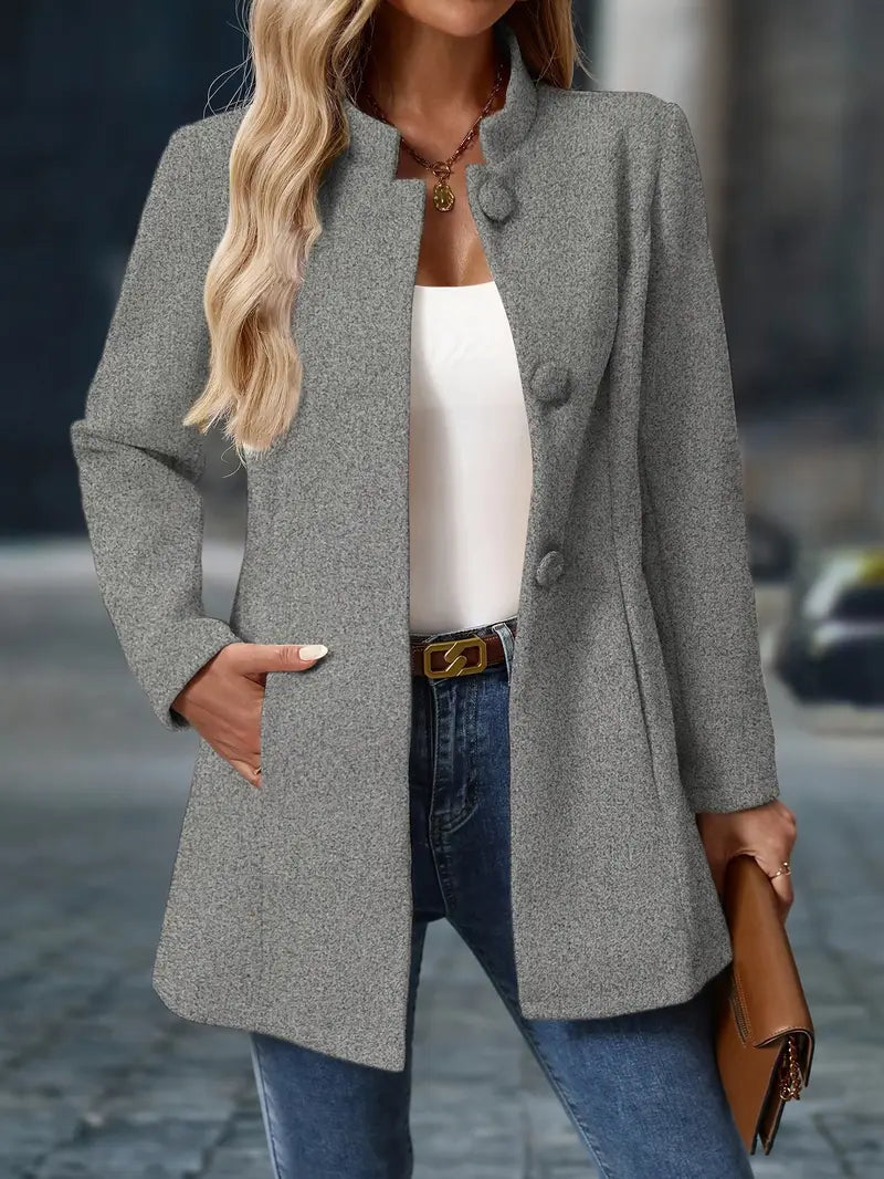 Stand-collar button-front coat, product still life