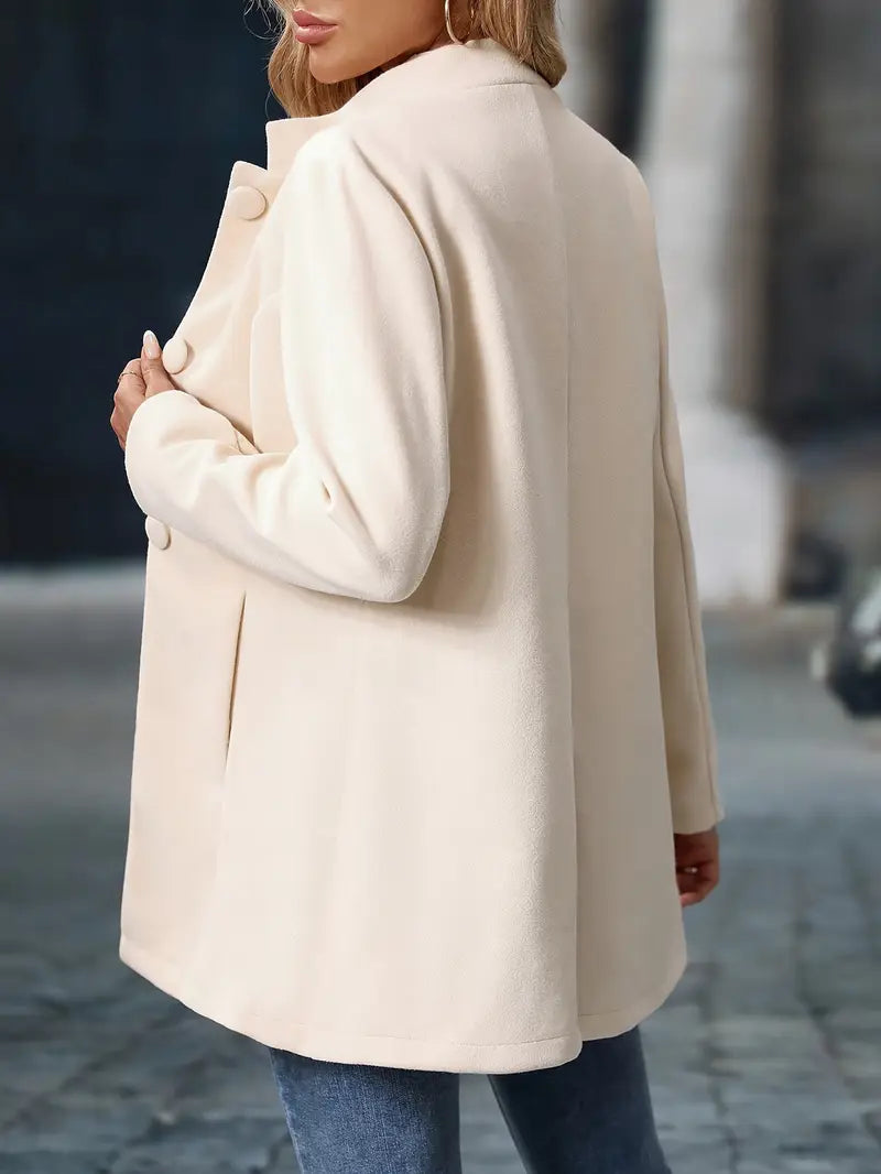 Stand-collar button-front coat, product still life