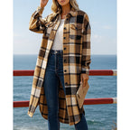 Checked longline coat, product still life