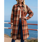 Checked longline coat, product still life