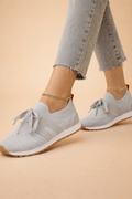 Women's grey lightweight knit trainers with a breathable upper