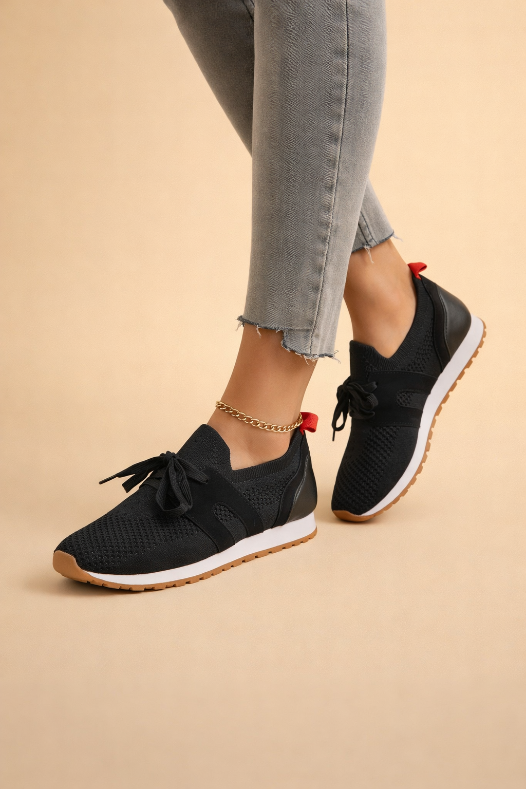 Women's grey lightweight knit trainers with a breathable upper