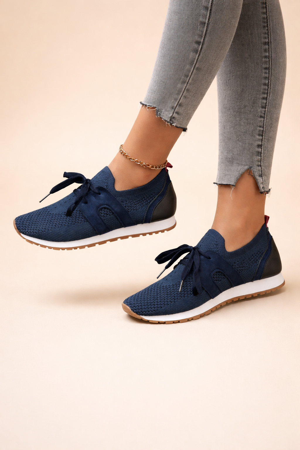 Women's grey lightweight knit trainers with a breathable upper