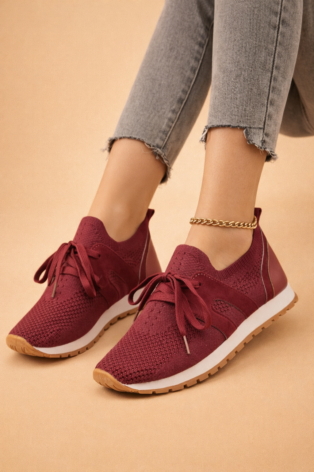 Women's grey lightweight knit trainers with a breathable upper