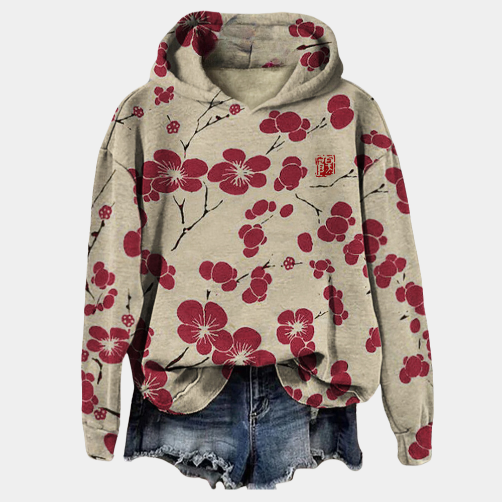 Blue botanical print hoodie with a relaxed fit and drawstring hood
