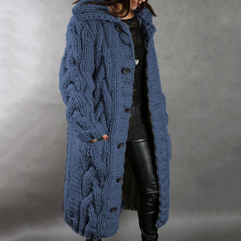 Women's blue oversized cable knit longline coat with a chunky texture