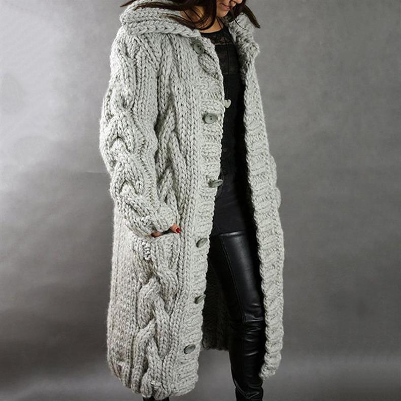 Women's blue oversized cable knit longline coat with a chunky texture